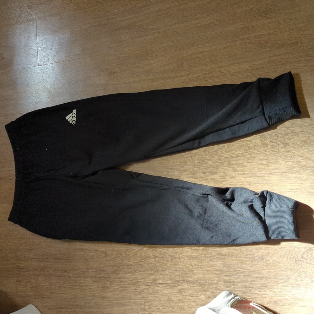 Adidas basketball pants.  A bit tight for a small.